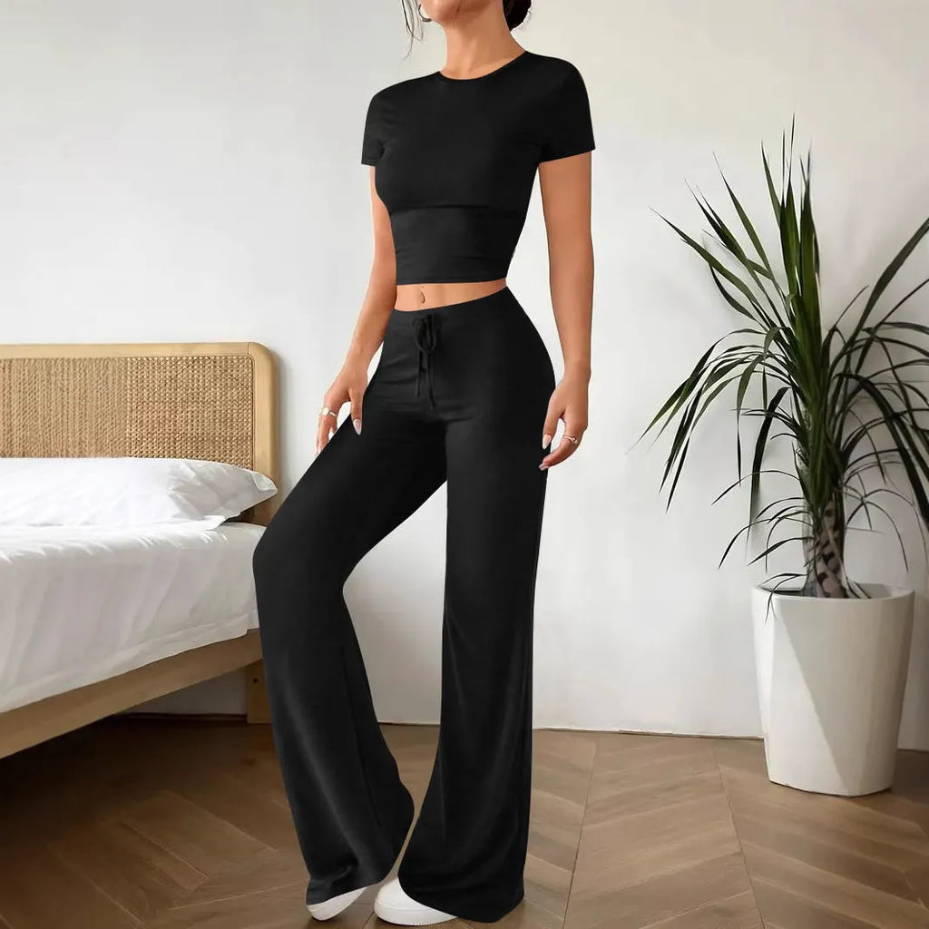 Black polyester women's suit set with high waist trousers and short sleeve t-shirt