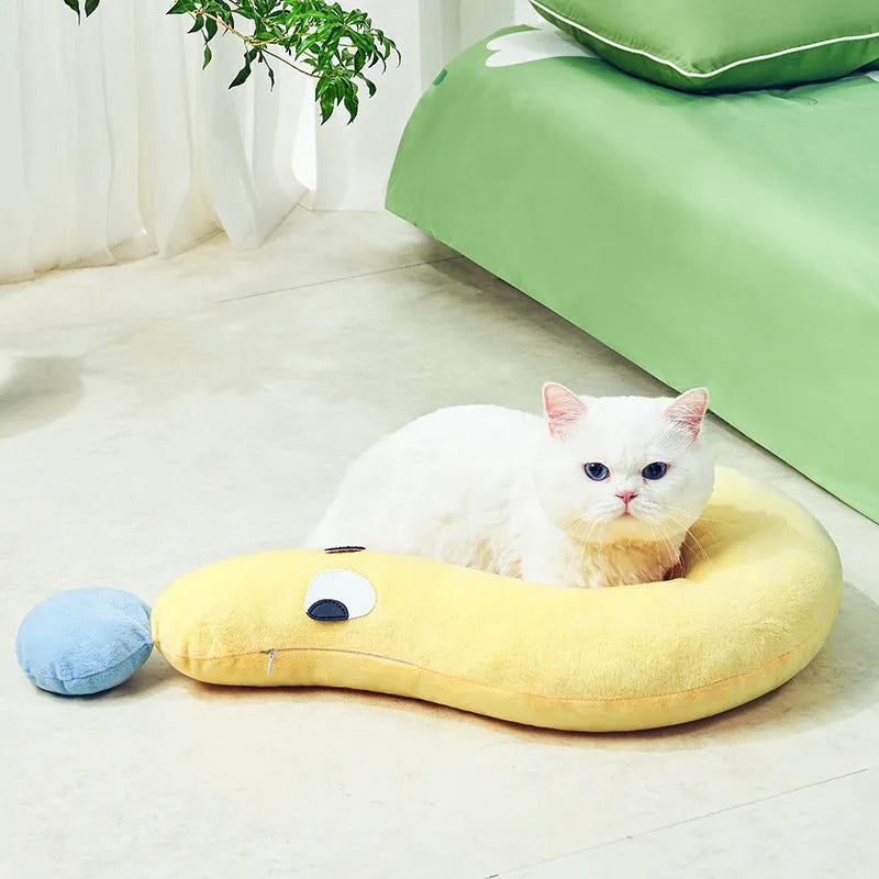 Blue rectangular pet sleeping pillow for cats and dogs on a floor, measuring 62cm by 39cm.
