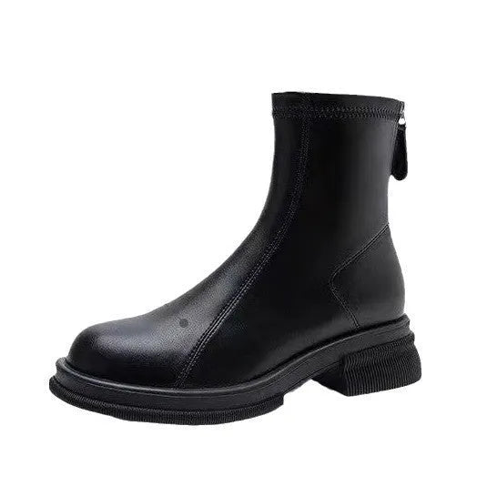 Women's black ankle boots with a flat thick heel, round toe, and rear zip fastener on a white background