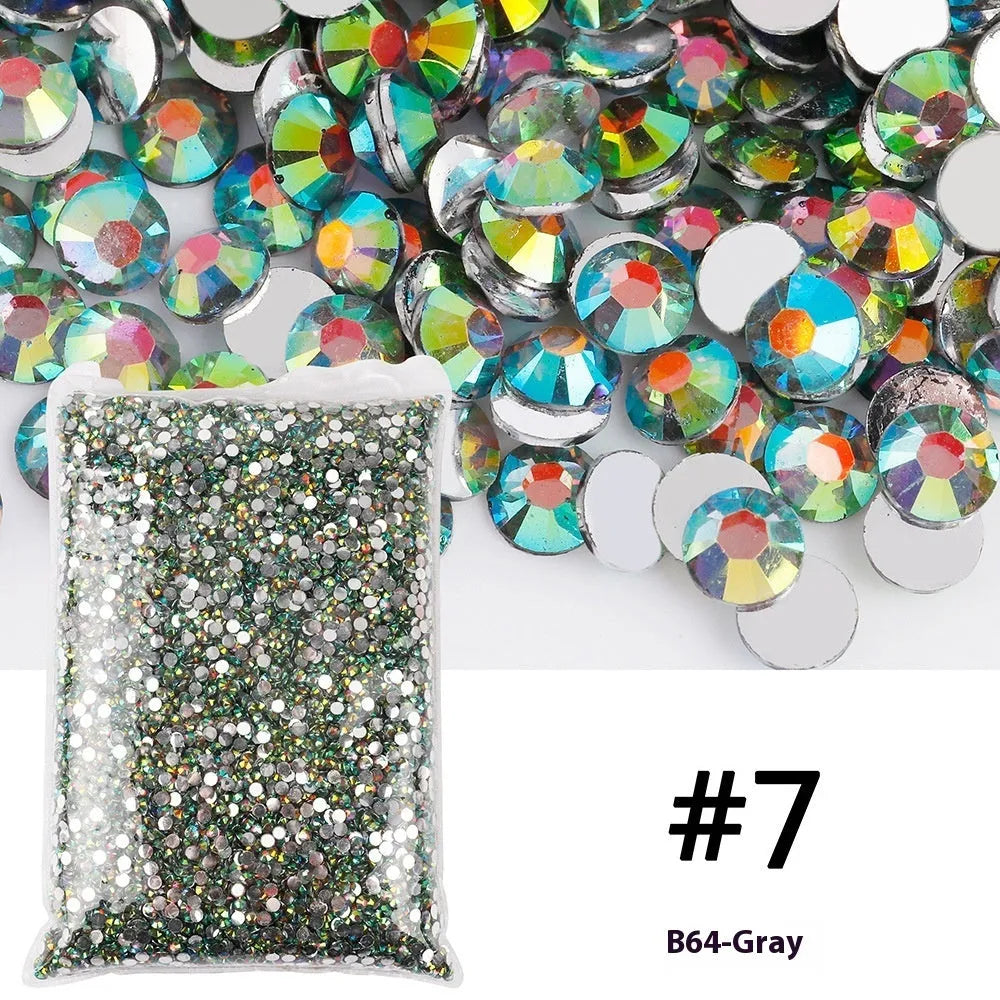 Plastic resin nail art rhinestones in multiple colours with electroplated surfaces arranged in mesh packaging