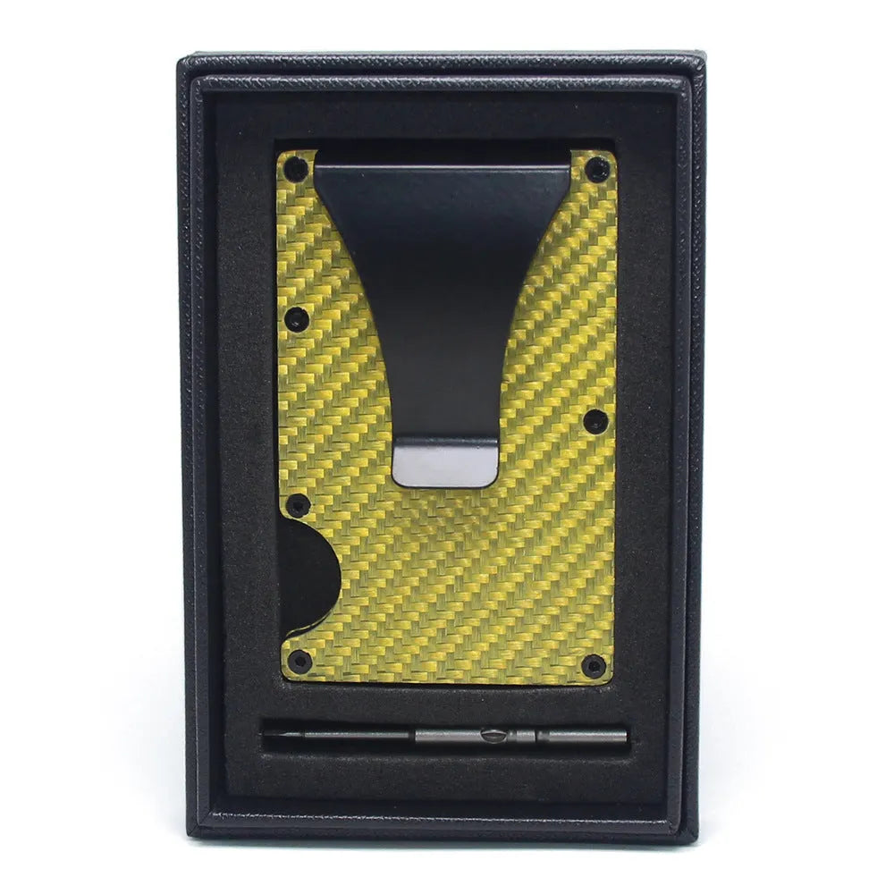 A slim carbon fibre card holder wallet in a geometric design, shown with business cards.