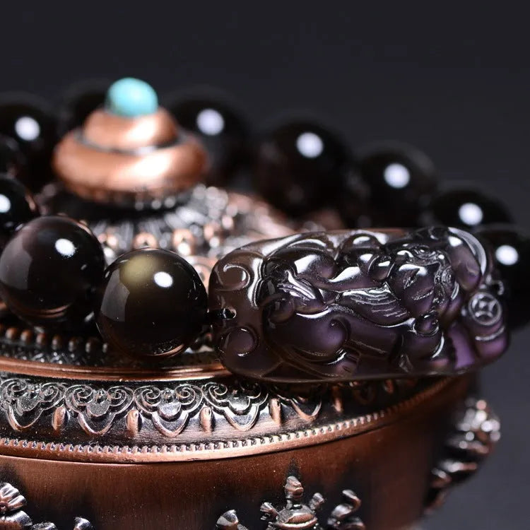 Polished geometric crystal bracelet with ice stone beads in various sizes on wrist