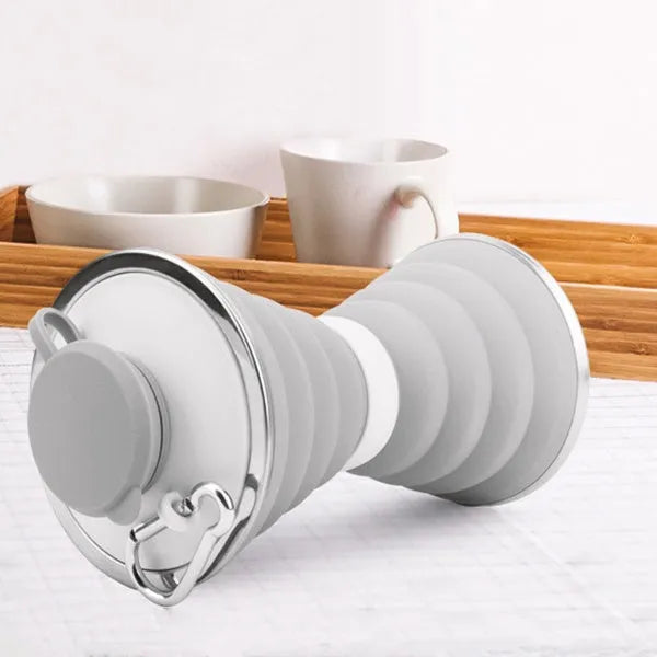 500ml foldable silicone water bottle cup in grey, collapsed to 9.6x4.6cm, with hanging hook and leak-proof lid