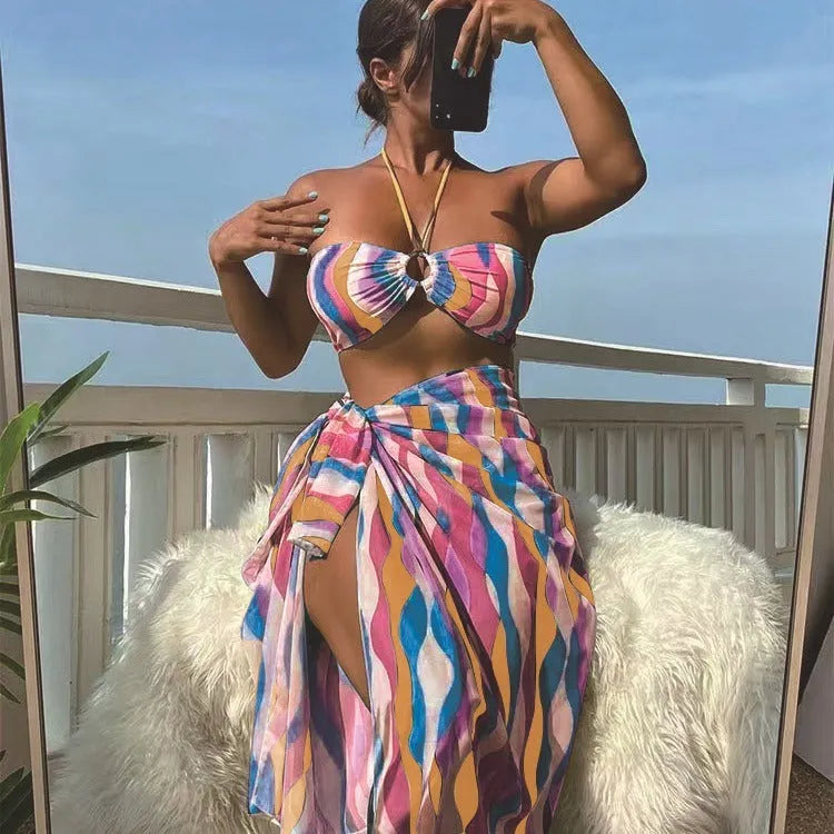 Yellow green women's split swimsuit three-piece set with printed beach skirt.