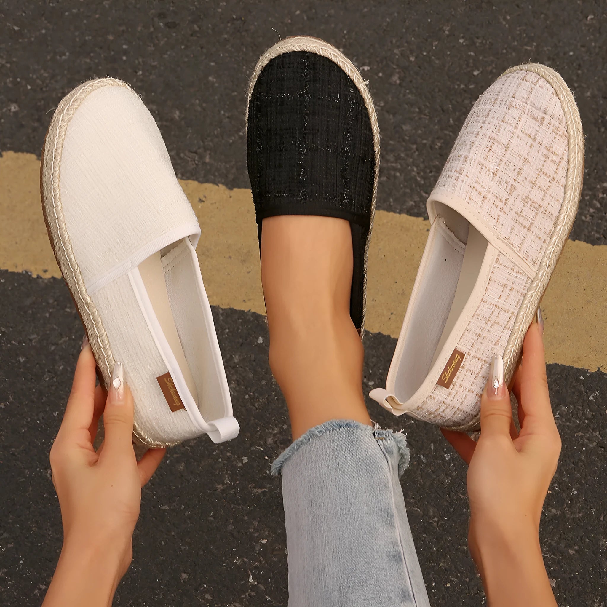 Beige rope sole fisherman shoes with canvas uppers and flat heels