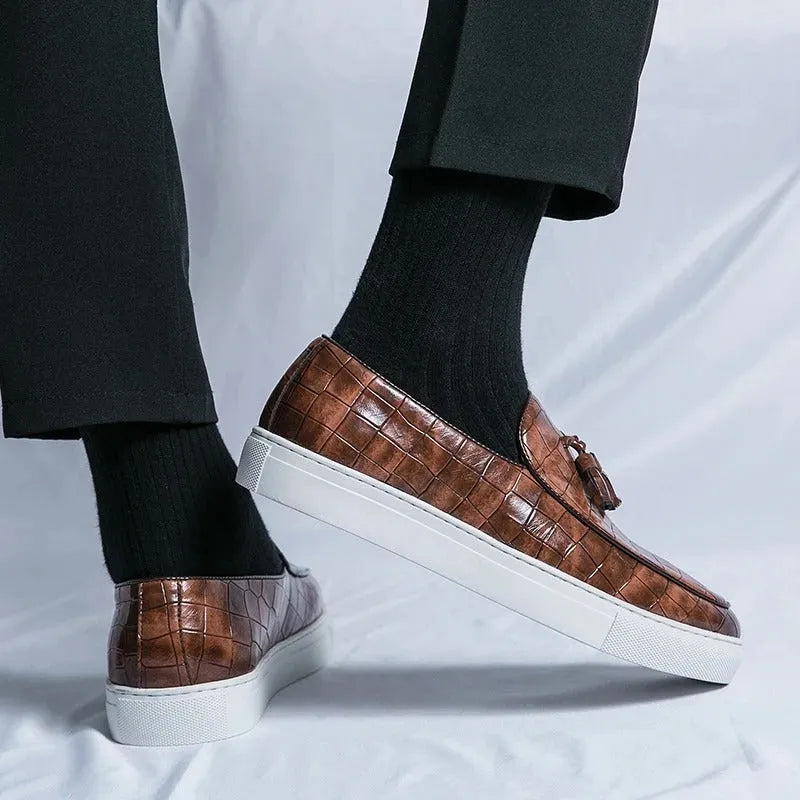 Men's brown plus size business casual sneakers with tassel detail on the PU leather upper and a rubber sole.