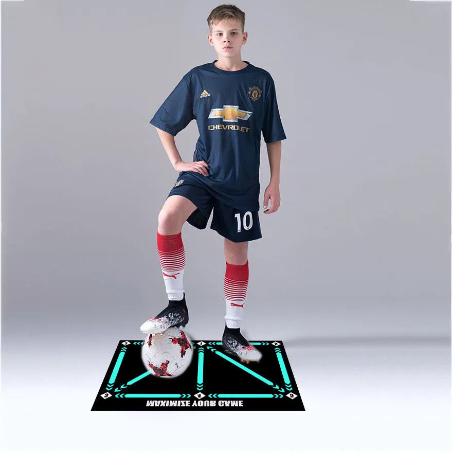 Black non-slip football training mat measuring 60 by 90 centimetres