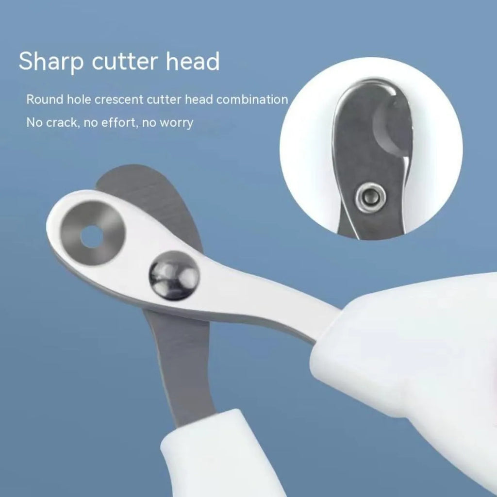 Blue pet nail clippers with circular hole design and cushioned handle on a white background.