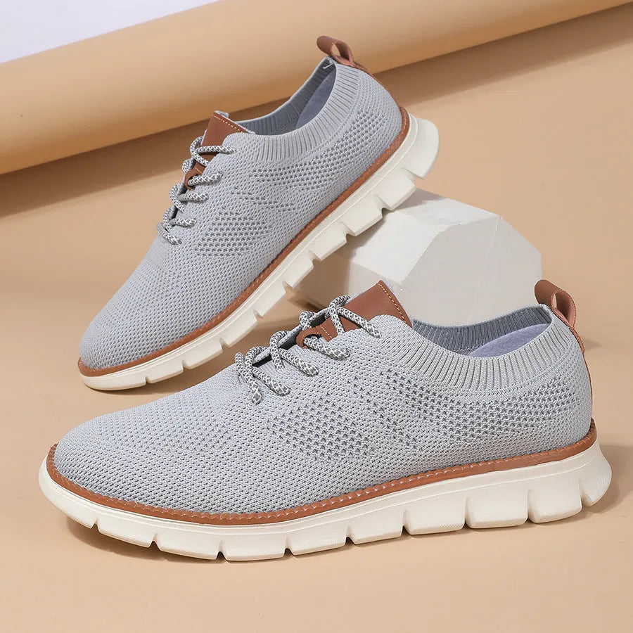 Men's grey and black mesh casual sneaker with round toe and low heel