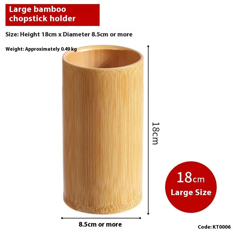 Wild bamboo chopsticks holder tube in various sizes on a wooden table.