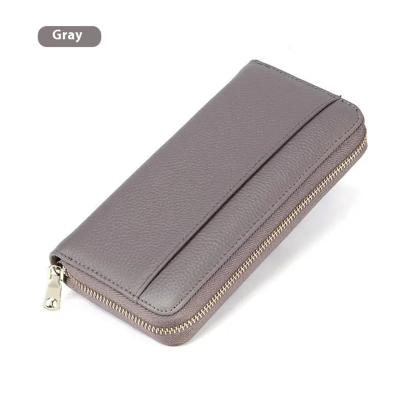 Long genuine leather women's wallet in a choice of six colours, showing large capacity and anti-theft card feature.