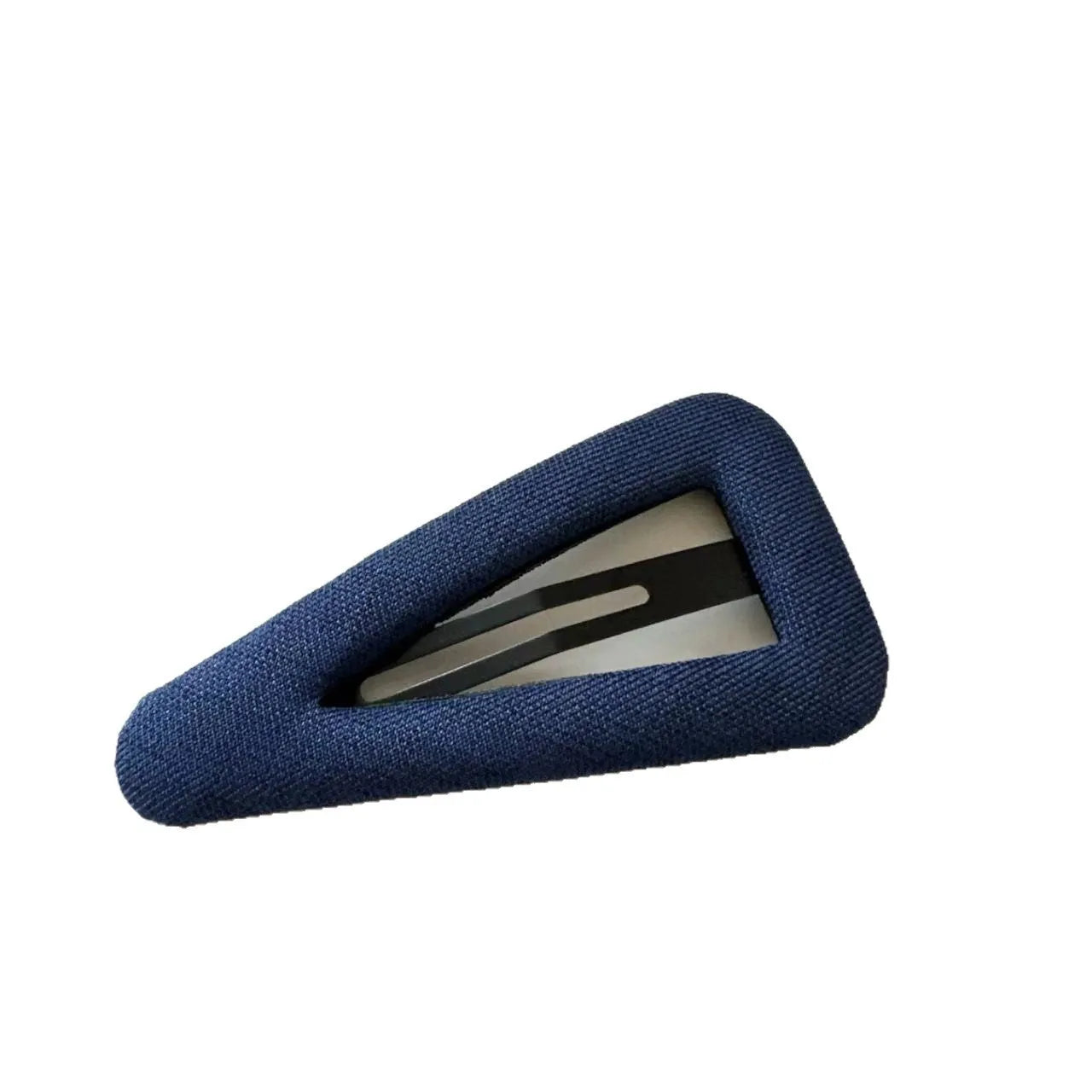 Dark denim barrette with white polka dots in a triangle shape next to a water drop shaped barrette.