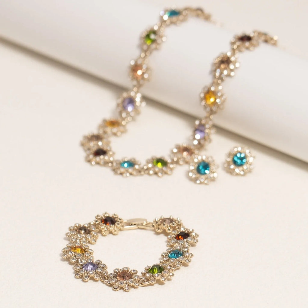 Colorful rhinestone necklace, earrings, and bracelet set on display, electroplated zinc alloy, geometric pendant