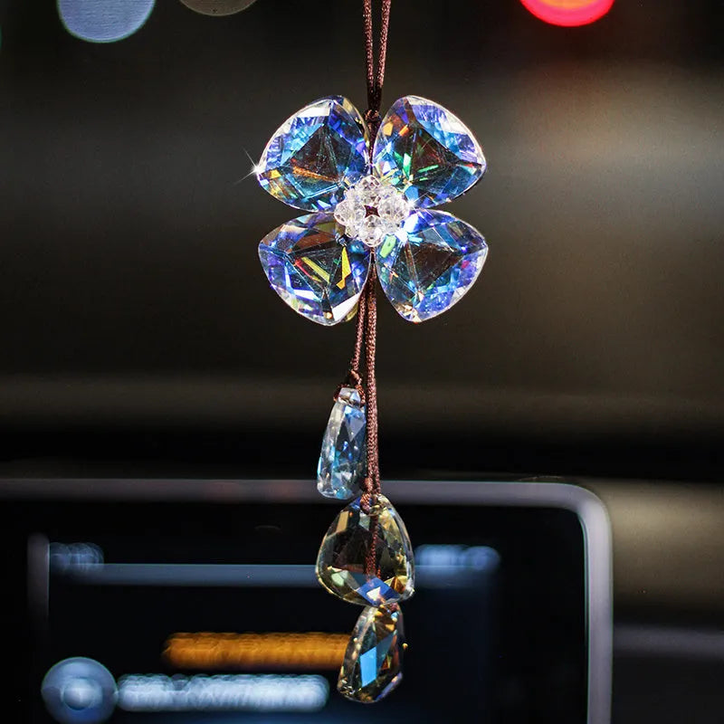 Crystal Four Leaf Grass car pendant hanging, showing its approximately 20cm size and transparent finish.