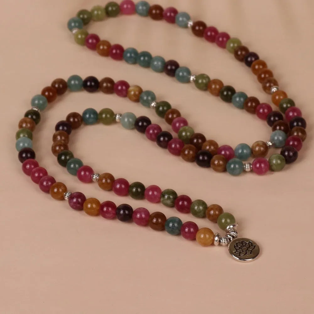 108 beads string lotus hanging multi-layer bracelet in tourmaline colour on alloy.