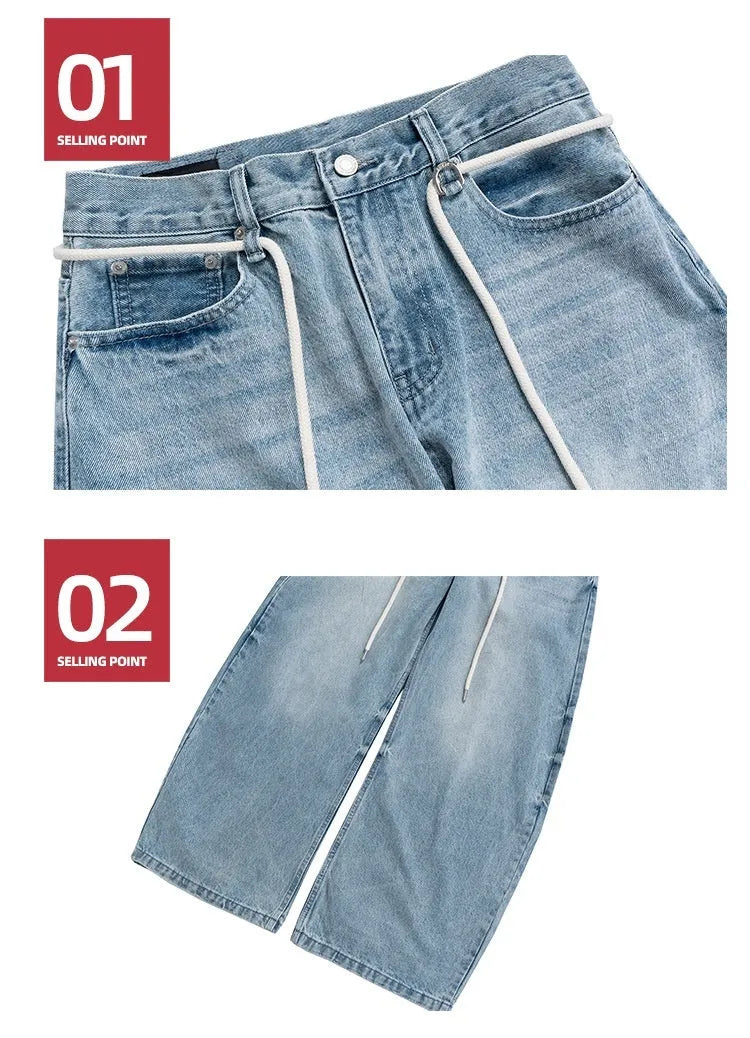 Blue vintage washed denim trousers with drawstring waist and straight-leg cut