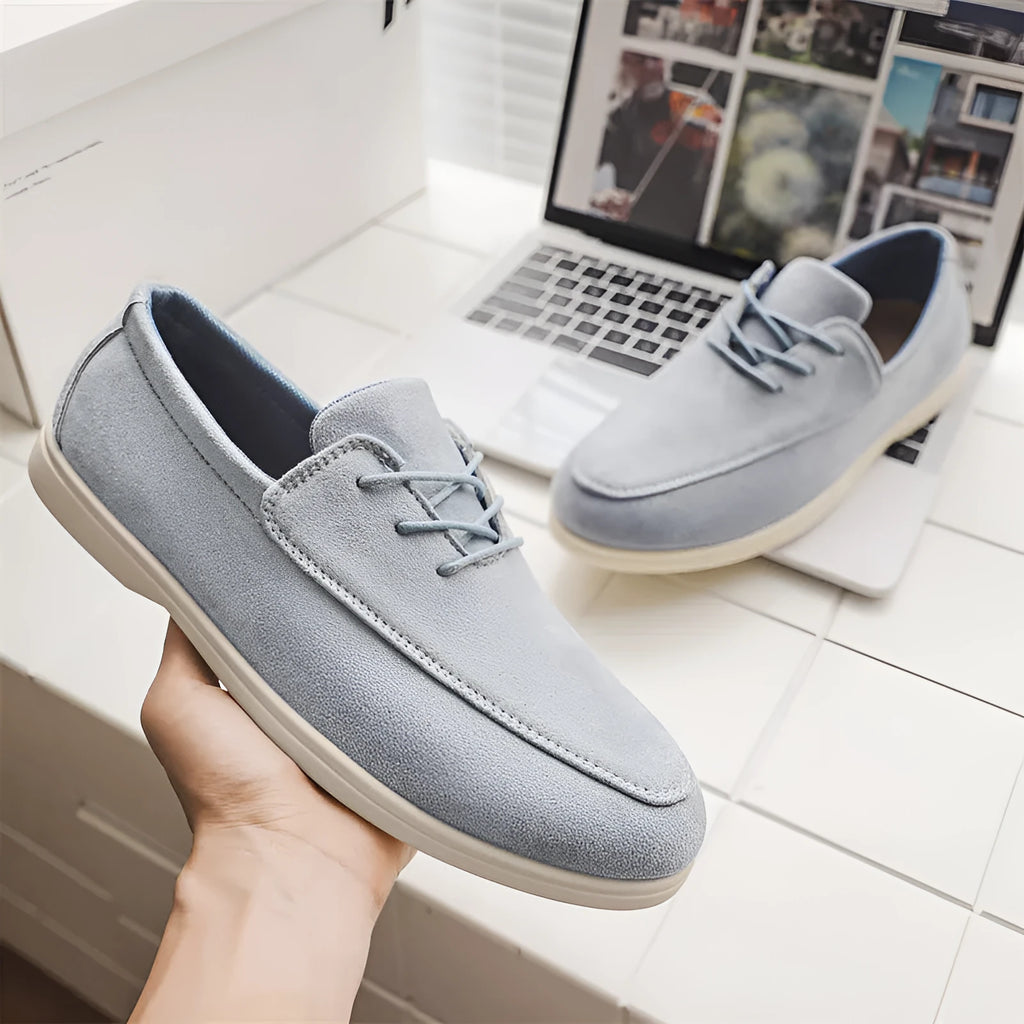 Men's slip-on suede loafers in beige with elastic band and rubber sole, side view