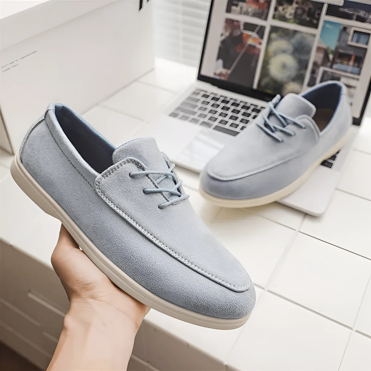 Men's slip-on suede loafers in beige with elastic band and rubber sole, side view
