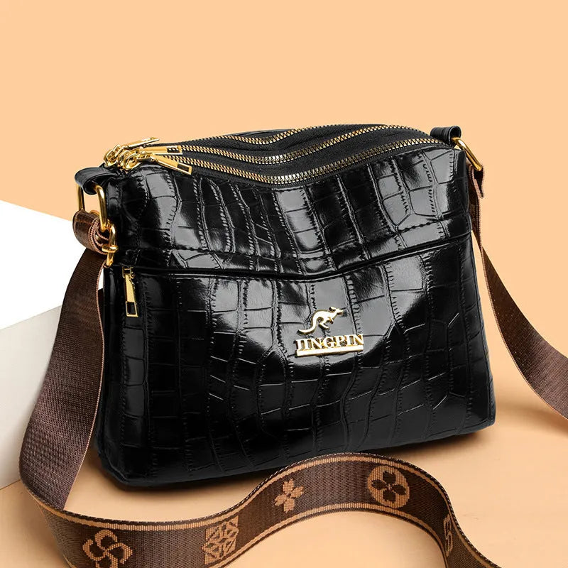PU leather cross body messenger bag with multiple compartments in horizontal square suitcase shape