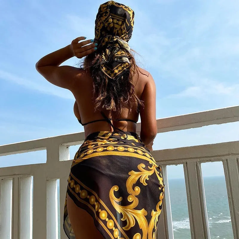 Women's vintage print lace-up bikini swimsuit three-piece set in blue on a mannequin.