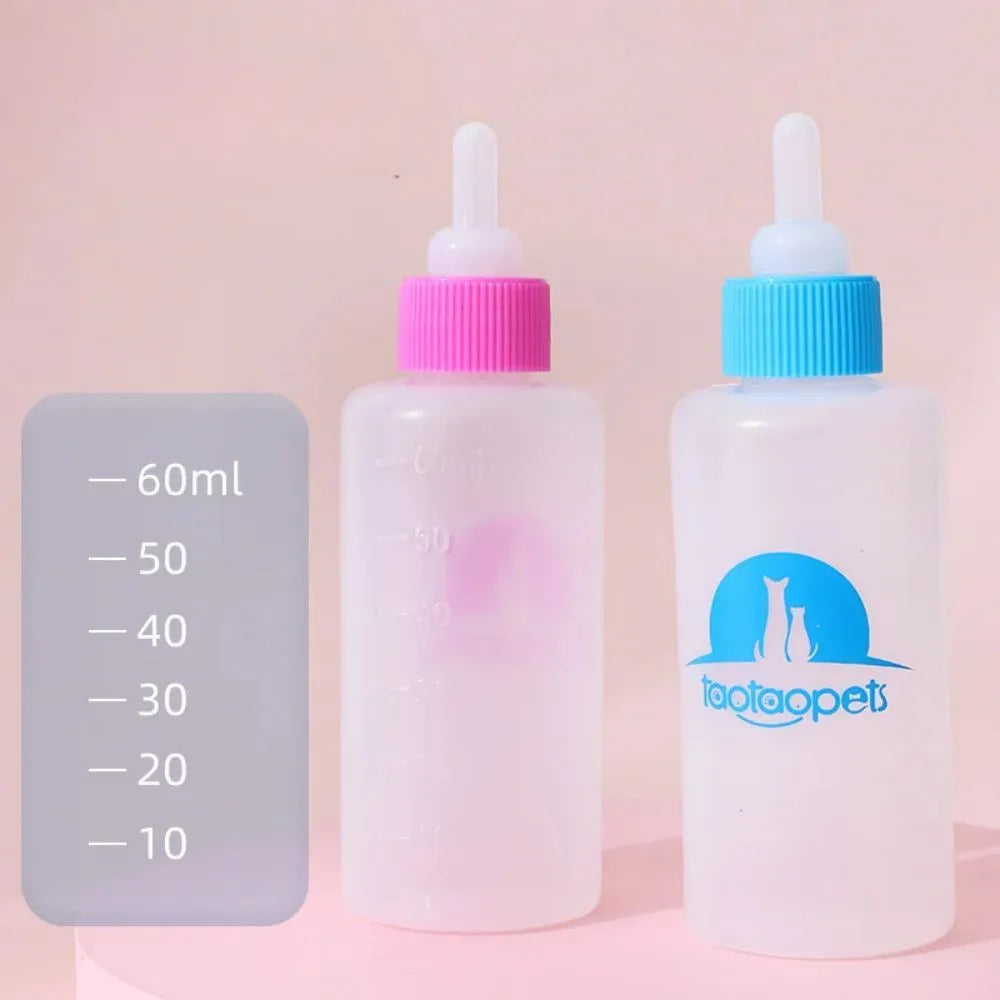 Set of four coloured pet milk bottles and a cleaning brush for feeding small animals