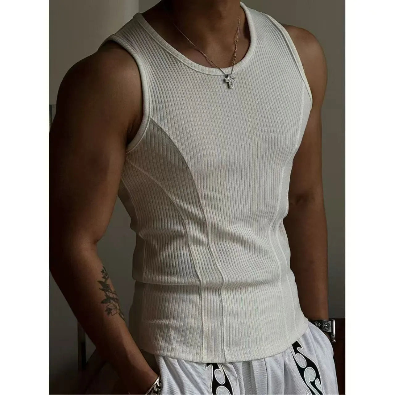 Men's black I-shaped sleeveless vest top made from polyester fabric for summer sports wear.