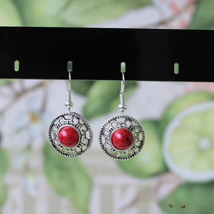 Miao silver retro turquoise flower disk earrings with geometric ethnic design in red, blue, or black colours