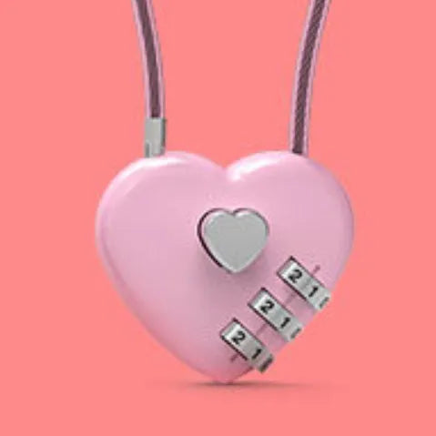 Peach Heart shaped wire rope lock in ABS plastic for securing bicycle helmets.