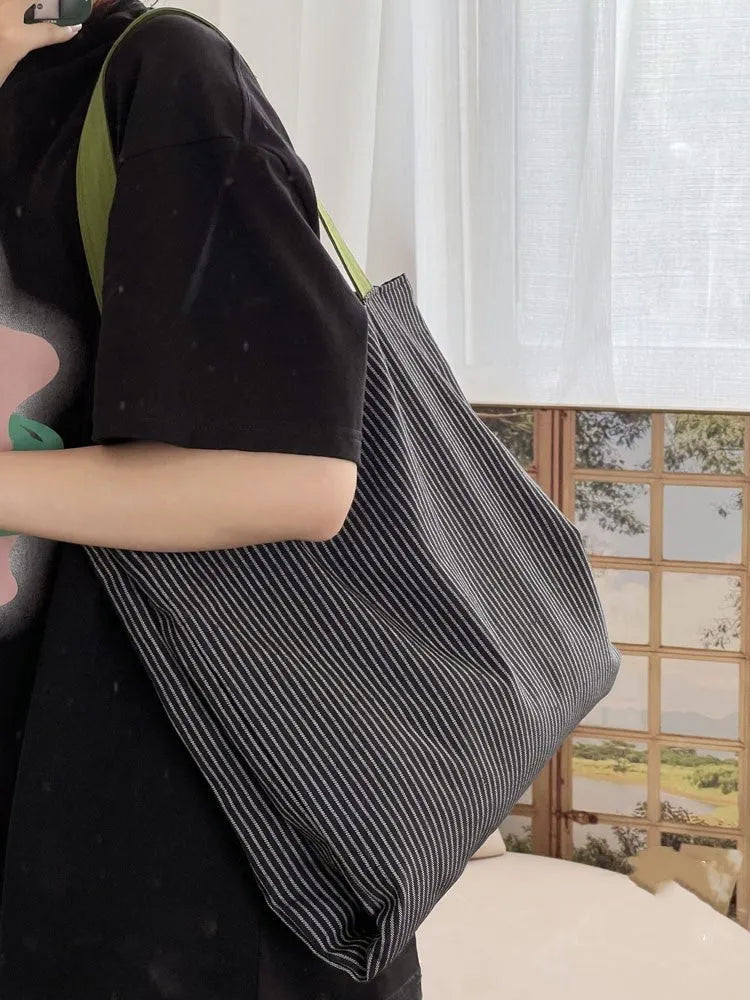 Canvas tote shoulder bag in plaid or striped design with multi-layer compartments