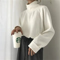 Women's loose fit long sleeve polyester top with half-high collar in solid apricot colour