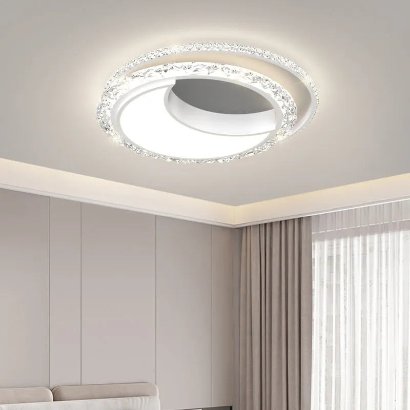 Modern round iron ceiling lamp in black finish mounted on a white ceiling.