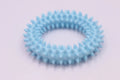 TPR spiky circle ring dog chew toy in assorted colours for dental cleaning and bite training