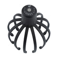 Black electric scalp massager with 12 TPE flexible massage arms and USB charging cable on white background