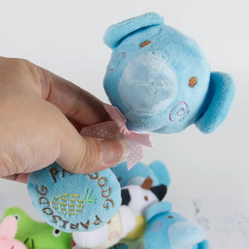 Plush dog toy with cotton rope and sound device in animal designs