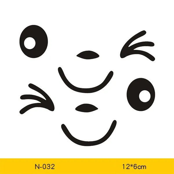 Pair of reflective cartoon eye car stickers on a vehicle rearview mirror.