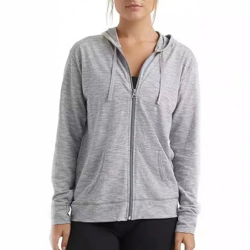 Loose fit solid colour polyester sports hoodie on a hanger