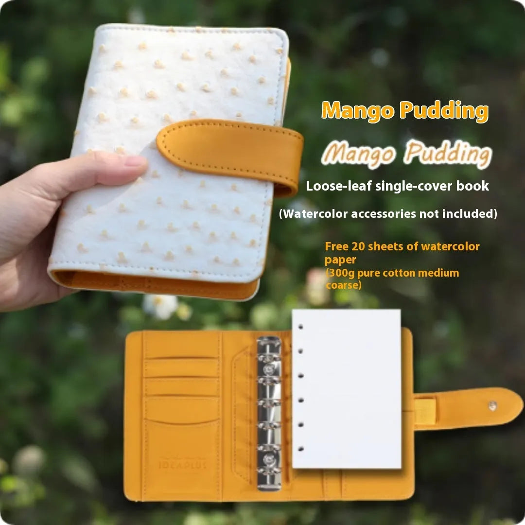 A7 size loose-leaf watercolour sketchbook in avocado green, showing miniature dimensions and removable pages.
