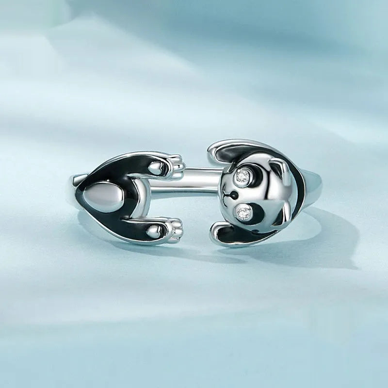 Adjustable sterling silver panda ring with white gold plating and open design