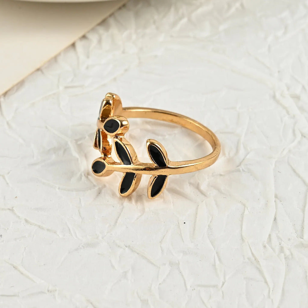Gold-coloured acrylic leaf geometric ring for women with electroplated finish