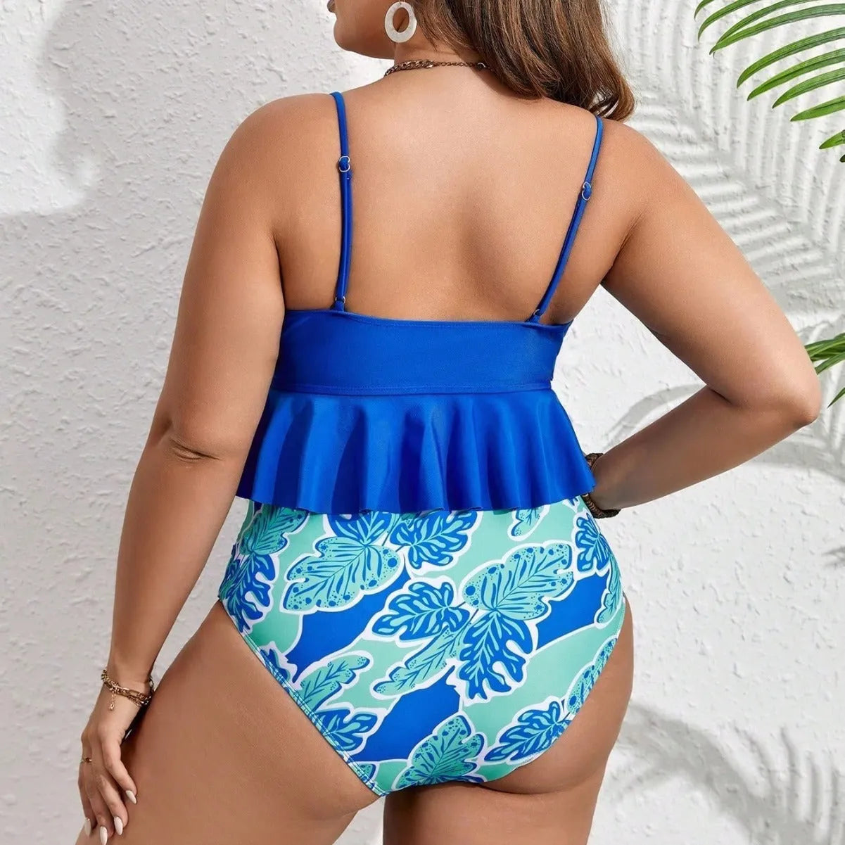 Blue women's two-piece bikini swimsuit with brief style bottoms in extended sizes