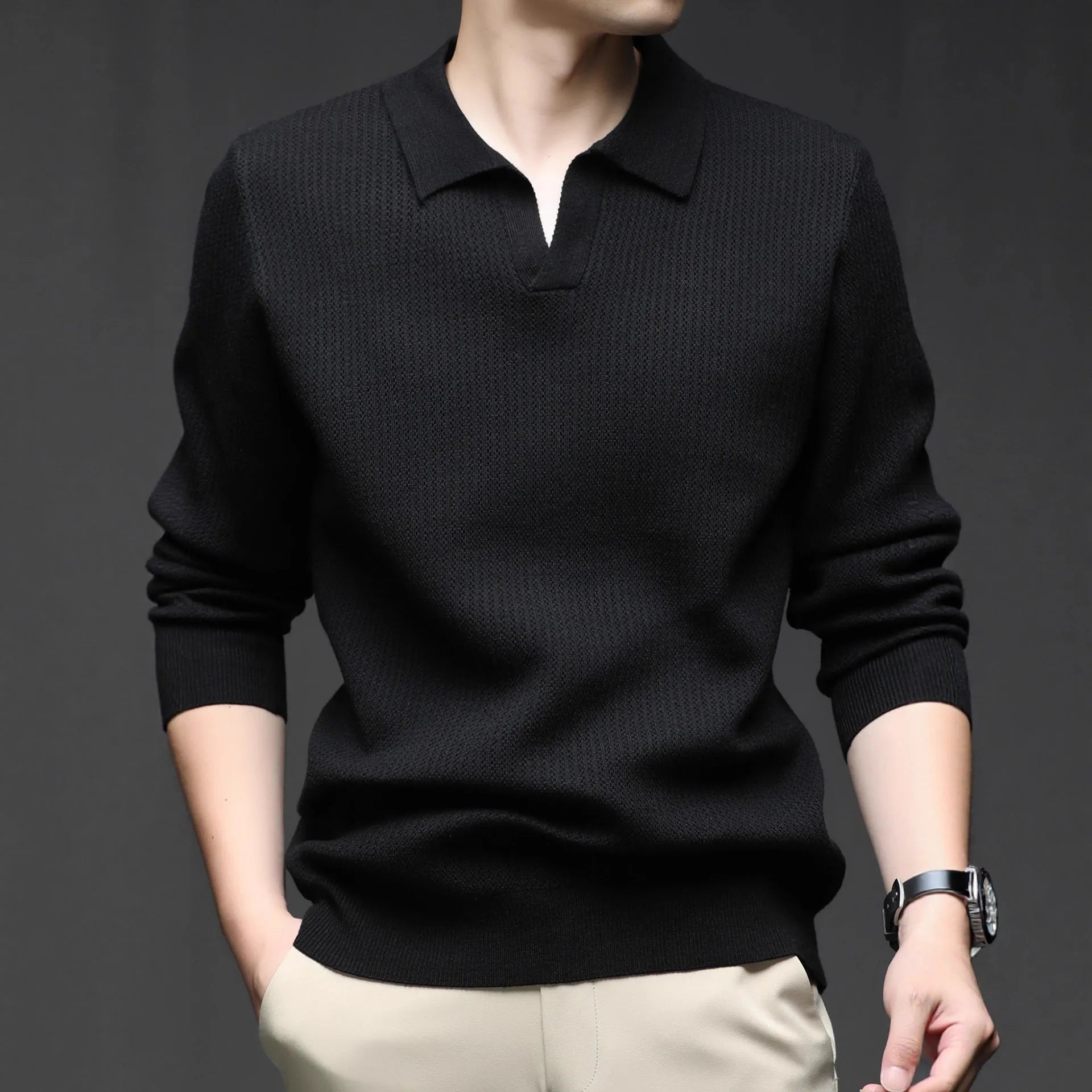 Men's loose fit casual green pullover sweater for autumn layering on a hanger.
