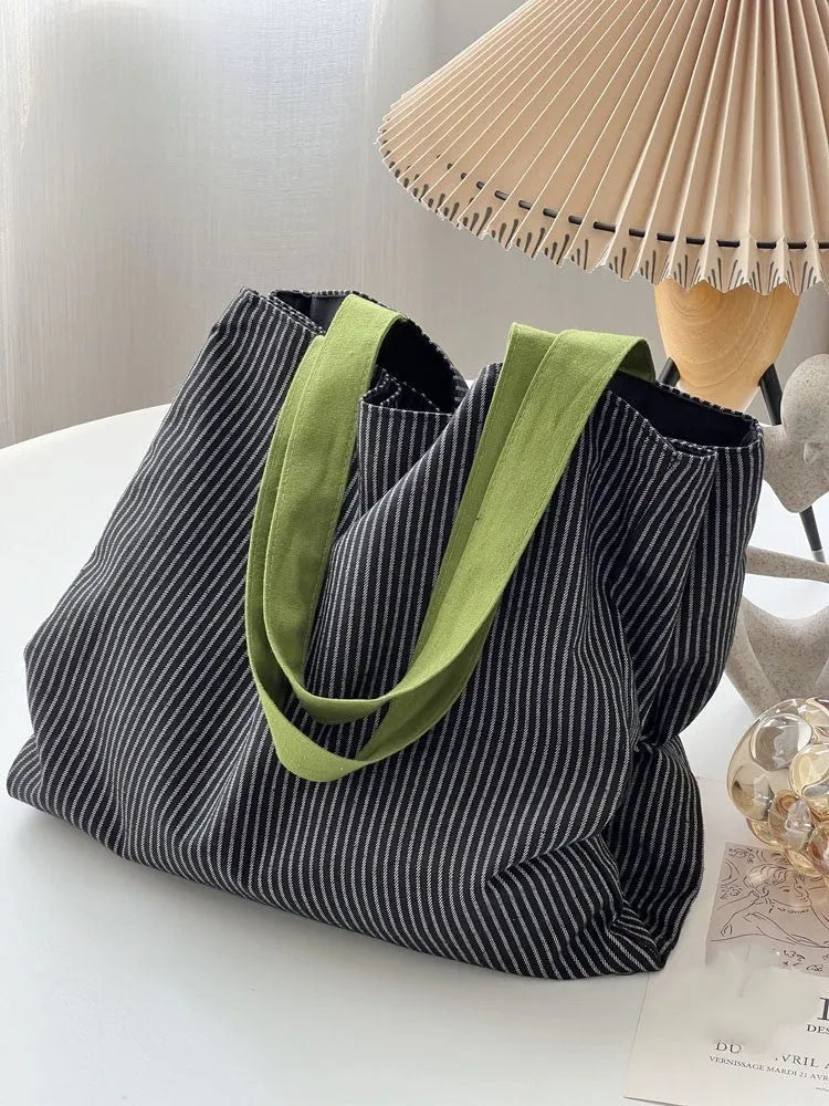 Canvas tote shoulder bag in plaid or striped design with multi-layer compartments