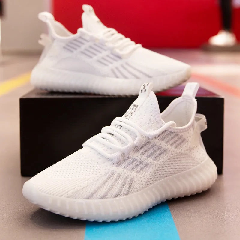 Men's white low-top platform sports shoes made from breathable flying fabric with a round toe and mesh lining.