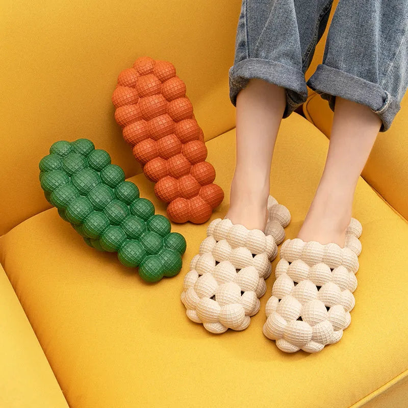 Creative Herringbone Baotou thick-soled bathroom slippers in orange, EVA sole with textured tread and upturned toe