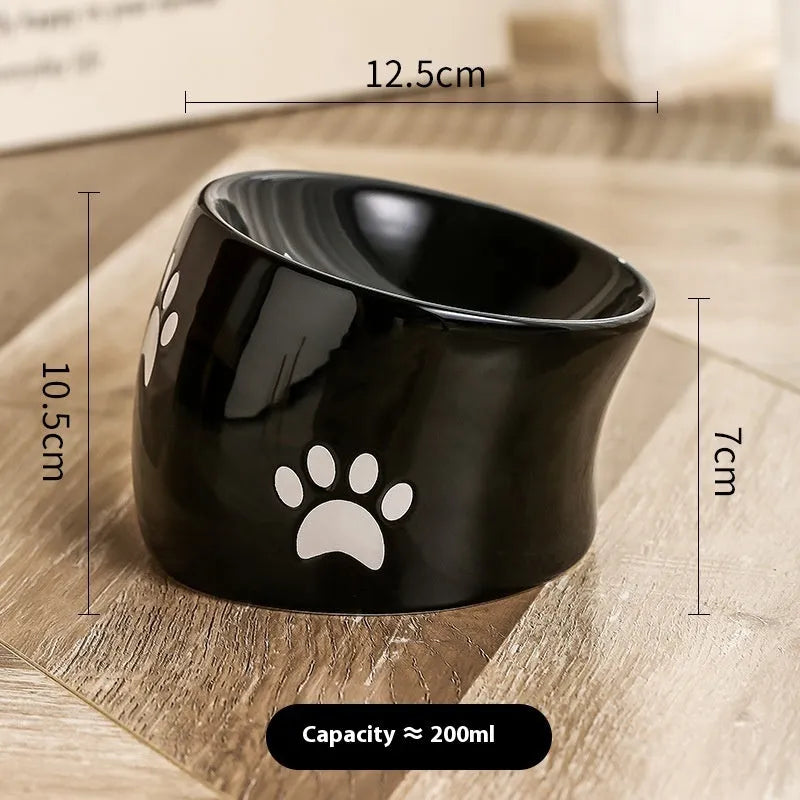 Ceramic cat bowl with high foot design in cat's paw pattern available in multiple colours