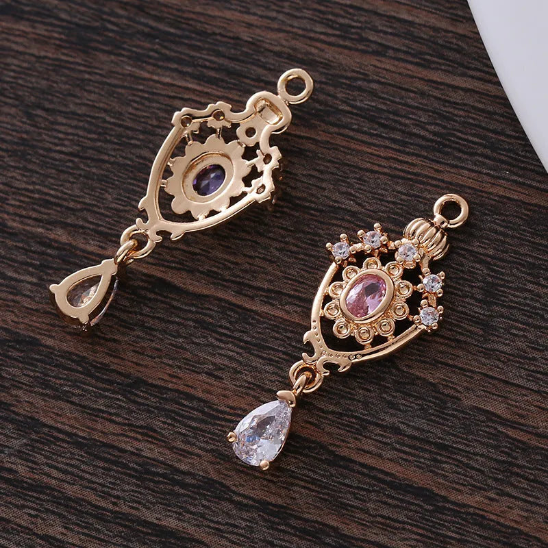 Small crown hollow water drop pendant with micro inlaid zircon details in five colours.