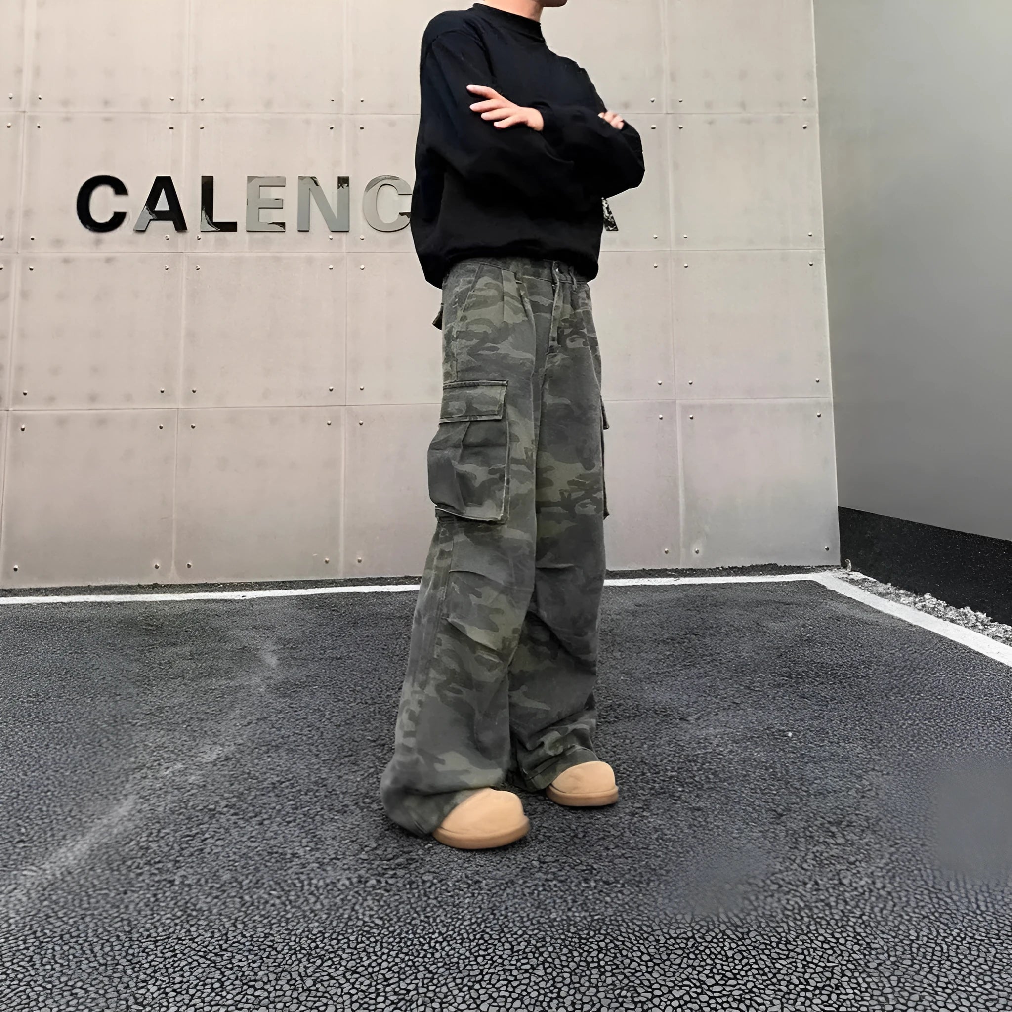 Camouflage K0915 coloured cargo pants with multiple pockets and a washed fabric texture