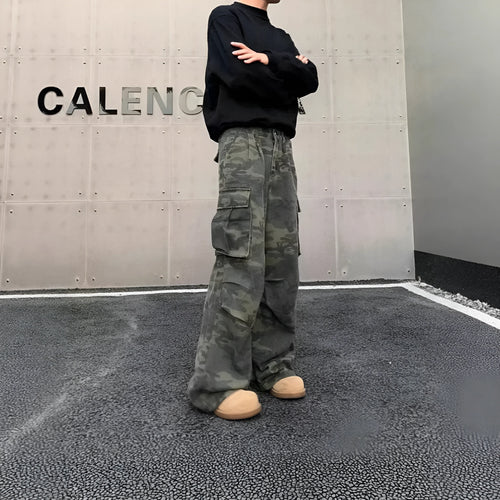 Camouflage K0915 coloured cargo pants with multiple pockets and a washed fabric texture