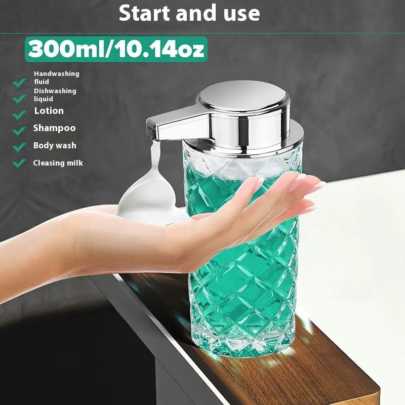Silver automatic soap dispenser with USB Type-C charging port on a bathroom counter.