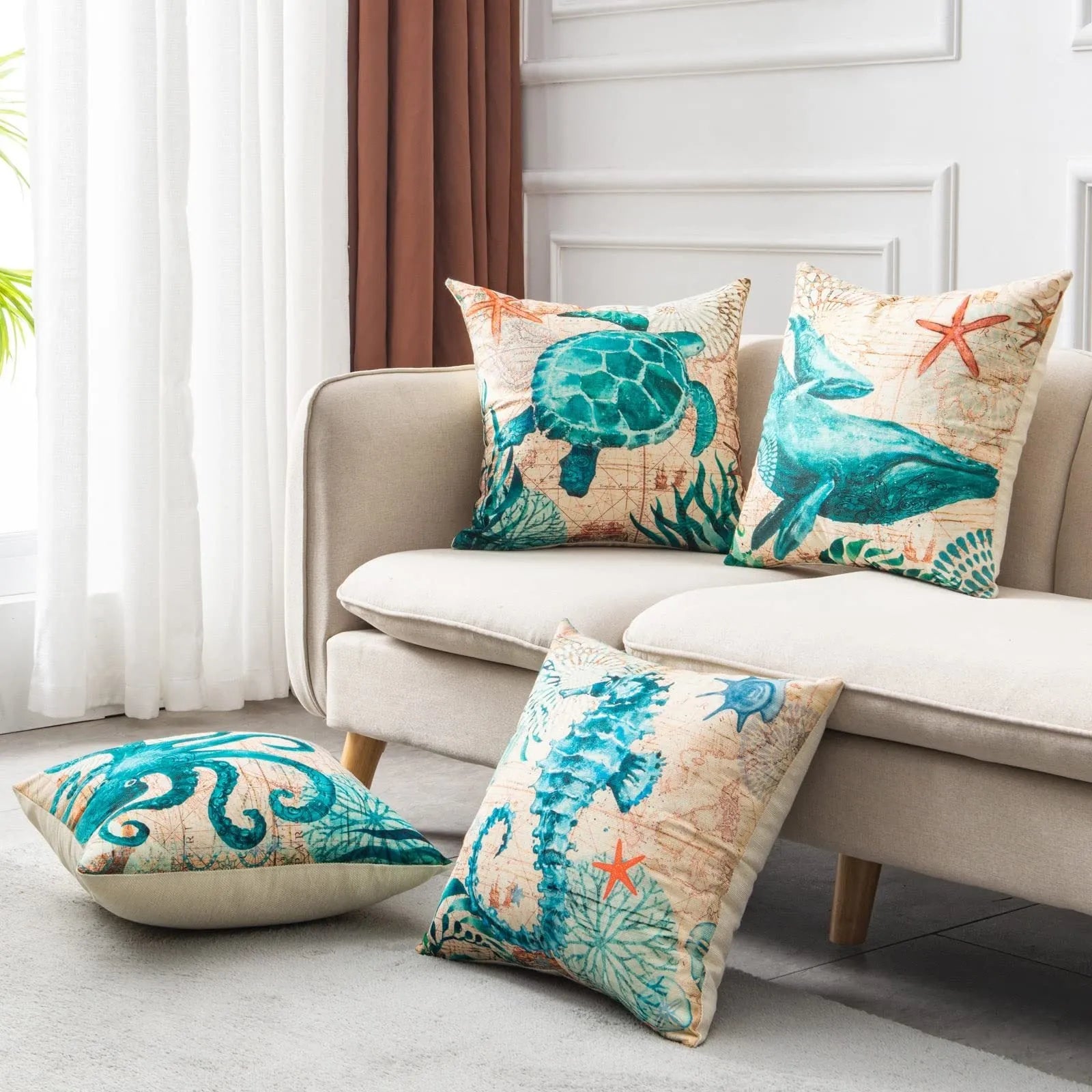 Square linen cushion cover with a detailed blue and green sea turtle print, showing the invisible zipper closure.